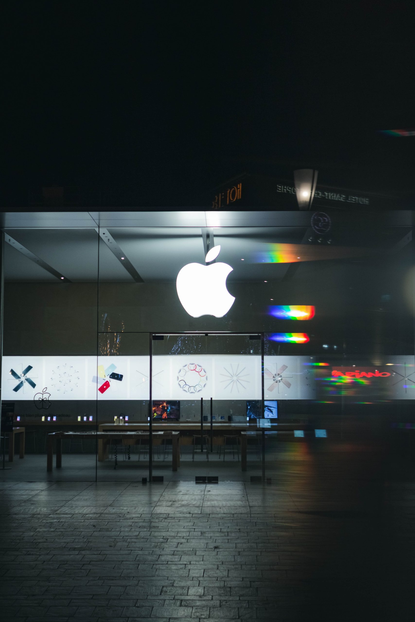 Apple company office frontage in glass with its logo on it